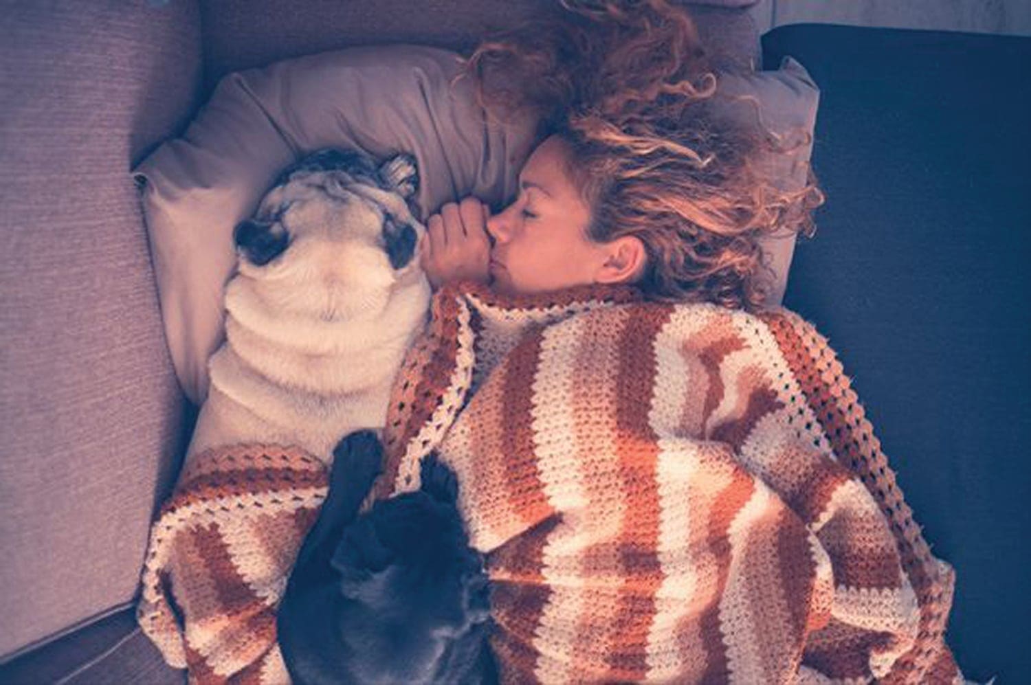 Women sleep better cuddling their pets rather than their partners